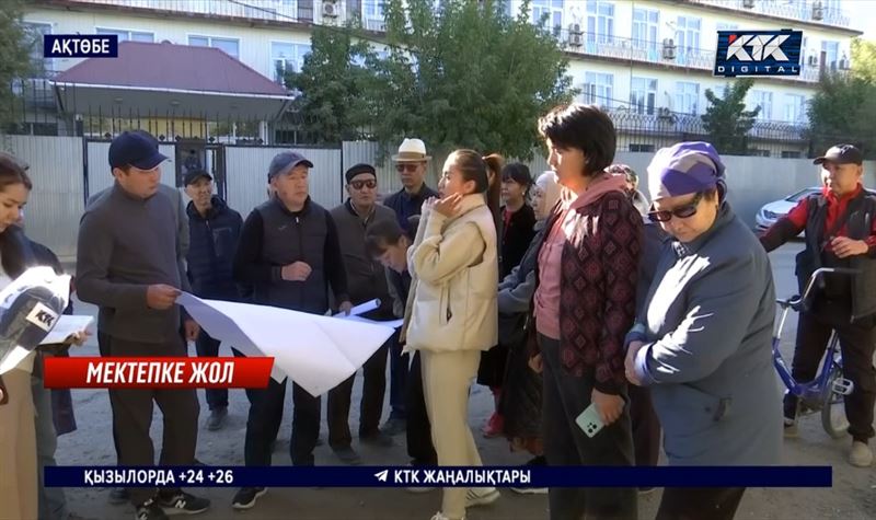 Ақтөбе: Мектепке баратын сапасыз жолда не бағдаршам, не жарық жоқ